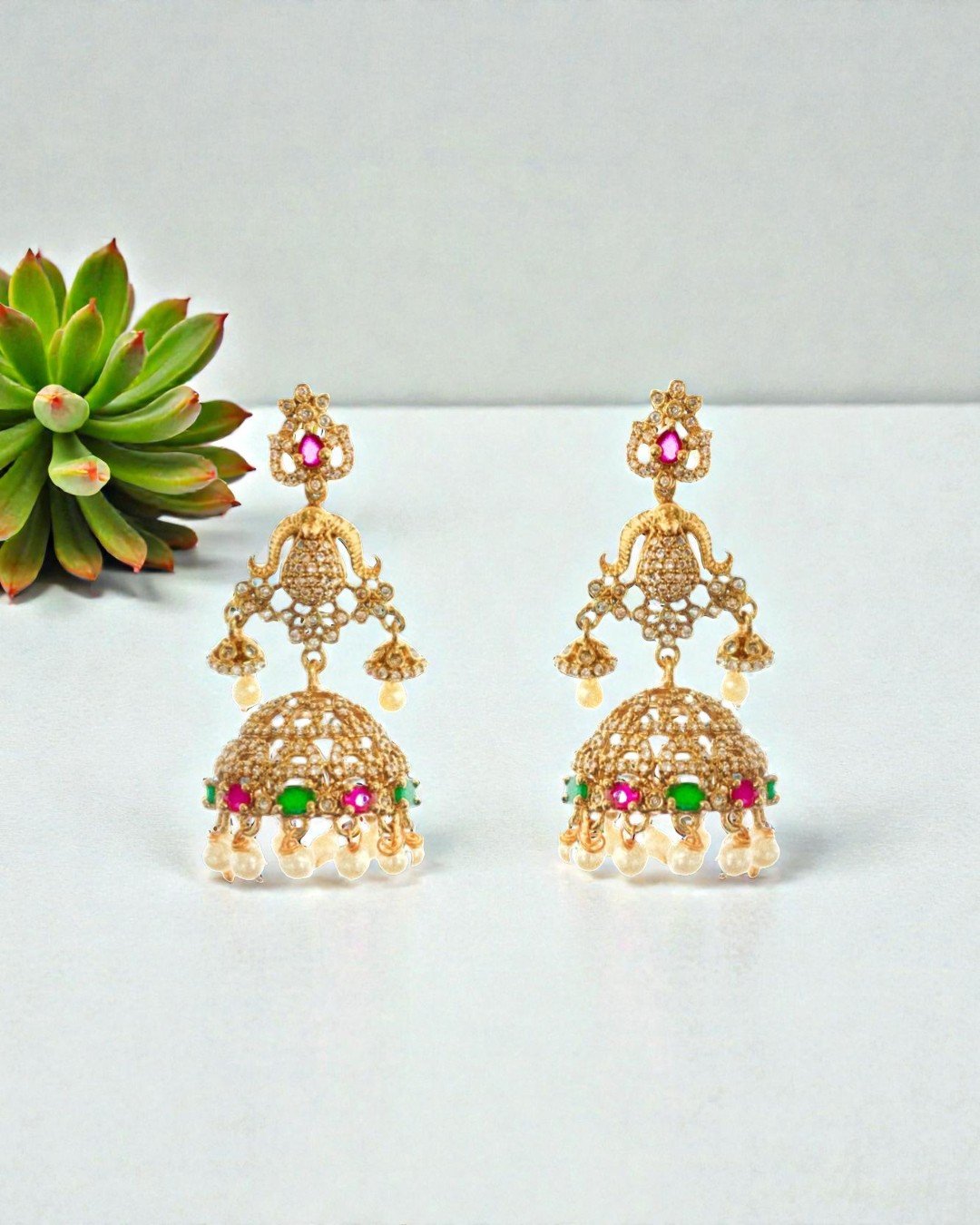 Emerald Stone Gold-Plated Jhumka Earrings with Pearl Droplets