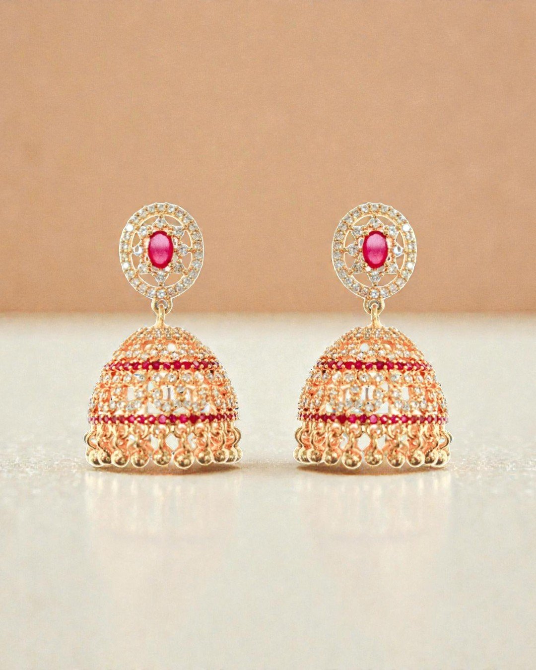 Elegant Rose Gold Jhumka Earrings with Ruby
